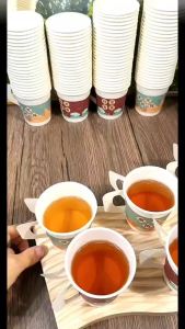 ถ้วยกระดาษการ์ตูน ใหม่ เทศกาลฤดูใบไม้ผลิที่ใช้แล้วทิ้ง วันปีใหม่ เข็มขัดป้องกันการลวกหนา จับ ถ้วยปีใหม่ที่สนุกสนาน