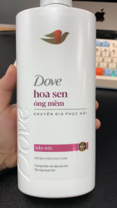 Dầu gội Dove óng mềm tự nhiên hoa chai 640G