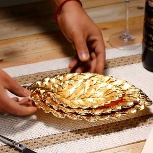 ห้องนั่งเล่นหน้าแรกผลไม้แห้งเมล็ดแตงโมถาดขนมโต๊ะกาแฟขนมขบเคี้ยวถั่วถาดผลไม้เครื่องสำอางวางถาดหรูหราแสง