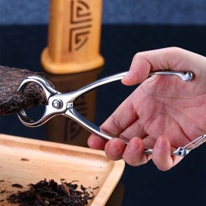 Kềm Cắt Bánh Trà Phổ Nhĩ  Có Lực Bung Đàn Hồi Lò Xo Đuôi Có Chốt Gài An Toàn.   Kềm Giúp Tách Bánh Trà Phổ Nhĩ Dễ Dàng