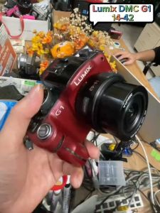 Máy ảnh Lumix DMC G1 kèm ống kính 14-42 zoom điện màn lật 360 độ