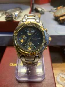 Đồng hồ nam hiệu ROMANETT CHRONO QUARTZsize 40mmchạy full 3 cốt 6 kimniềng xoayChronographbản thép đúcdây xương cá demi vàng dài 18cm chống nước tốt với đáy xoáy và núm vặn cổ chai sản phẩm có xước nhẹ kính và có bị phớt vàng