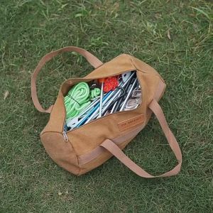 กระเป๋าเก็บเครื่องมือตั้งแคมป์กลางแจ้ง กระเป๋าใส่เล็บทรงกระบอก ถุงเก็บเชือกตะปูตอกตะปูค้อนกระเป๋าถือเกระเป๋าเครื่องมือกระเป๋า​ใส่​อุปกรณ์​แค้มป์ปิ้ง​ เชือกลม ค้อน สมอบก กระเป๋า​จัดเก็บ​อุปกรณ์​แค้มป์ปิ้งกระเป๋าถือเก็บของกลางแจ้งสีน้ำต