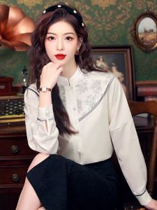 เสื้อเชิ้ตผู้หญิงคอตั้งแขนยาวผ้าชีฟองลายปักสไตล์จีนใหม่ฤดูใบไม้ร่วงแฟชั่นย้อนยุค เสื้อตัวบนกระโปรงทรงเอ