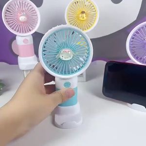 AXNAT Kipas Angin Genggam Mini Portable Kartun Kuromi Cinnamoroll Hello Kitty Melody Kipas Angin Tangan Bahan Silikon Mini Fan Kipas Lipat Portable Bisa Taruh Handphone SS269