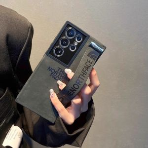 Fashionable Minimalist Silicone Wrist Strap Stand Full Cover Sheepskin Phone Case for Samsung Galaxy S24 Ultra S23U S22U Anti-Fall Business Couples