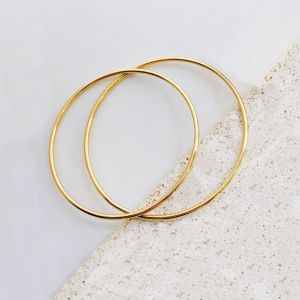 Vòng tay titan nữ tròn trơn 2 mm mạ vàng không đen gỉ (giá 1 vòng)