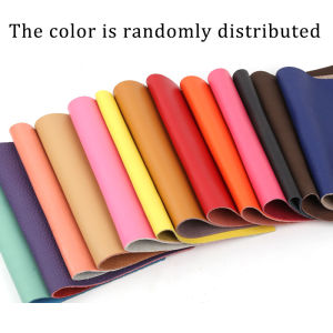 Handmade DIY leather crafts made of colored leather fabric including card holder and pencil case crafted from two-layer plain