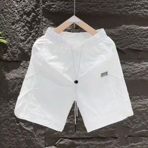 Quần Short Thể Thao Nam Mùa Hè Mới Nhanh Khô Thường Ngày Rộng Rãi Thoáng Khí Bằng Lụa Băng Lỗ Laser Quần Năm Mảnh