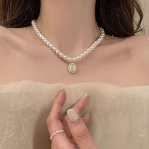 French Vintage Cats Eye Stone Pearl Necklace Womens Luxury Minimalist Sensation Clavicle Chain 2024 New Trend Set