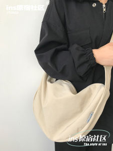 กระเป๋าสะพายผ้าไนลอนลําลองสไตล์ญี่ปุ่นและเกาหลีสําหรับนักศึกษาวิทยาลัยกระเป๋าสะพายข้างซิปน้ําหนักเบาสําหรับผู้ชายและผู้หญิง