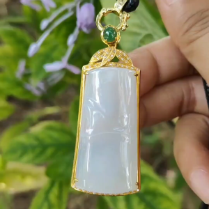 Crafted as Bamboo Pendant on Natural Type A Jadeite Jade set with 18k gold certificate weighs 15.82 grams measurement 55 * 22.9 * 9.8 mm (18kp84)