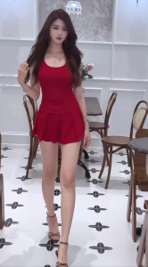 ชุดเดรสสั้นทรงเอ แขนกุด สีกรม คอยู เปิดหลัง ดีไซน์ผูกสายหลังคอและกลางหลัง กระโปรงทรงเอ จับจีบรอบ ผ้าโพลิเอสเตอร์ เซ็กซี่ Dress เดรสไปผับ #8122