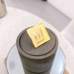 Huy hiệu cài áo pin cài áo Manulife đồng mạ vàng - Q.1 Tp.HCM