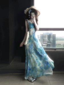 ชุดเดรสยาวแขนกุดลายดอกไม้สไตล์ฝรั่งเศส กระโปรงทรงเอเอวสูง ผ้าฝ้ายผสมโพลีเอสเตอร์ ฤดูร้อน 2025 สำหรับผู้หญิง