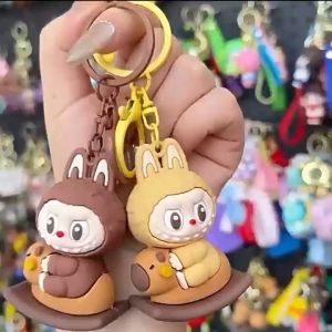 Creative cartoon labubu keychain Rocking Horse keychain cute pendant charm birthday gift girls key chain拉布布钥匙圈