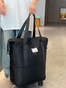 Durable Waterproof Expandable Duffel Bag with 4-Wheel Trolley for Travel and Fitness