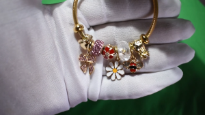 Lunara Gold Daisy Bee Charm Bracelet with Bow
