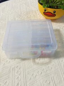 Versatile 12+1 compartment storage set—featuring a combination of a large outer box and transparent lidded inner boxes—designed