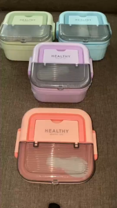 Portable stainless steel insulated lunch box with a leakproof design complete with a handle and removable spoon 6704