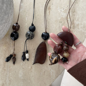 New Chinese Style Long Beaded Necklace Womens High-End Feeling Vintage Cord Pendant Sweater Chain Accessory Plant Seed Shell