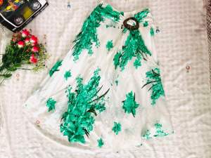 กระโปรงทรงเอ แฟชั่นผู้หญิง ลายดอกไม้สีเขียว มีซับใน เอวยางยืด