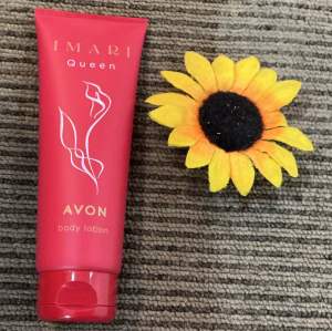 Avon Imari Body Lotion Freedom (blue) Naturelle (pink) Queen (red) with floral design.