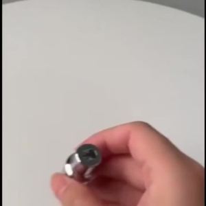 A steel shock absorber socket—a tool for the removal and installation of shock absorbers—compatible with "Double-D" profiles.