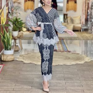 Baju set wanita tenun
