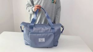 กระเป๋าเดินทางแบบถือ พับได้ กันน้ำ จุของได้เยอะ ค้นหาของง่าย กระเป๋าจุของ