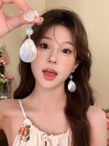 ต่างหูลูกปัดเปลือกหอยสไตล์วันหยุดชายหาด ดีไซน์หรูหรา เครื่องประดับแฟชั่น ต่างหูแบบลูกปัดรูปเปลือกหอย เครื่องประดับสุดเก๋