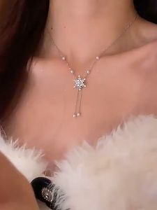 🔥IVY Pearl Snowflake Tassel Necklace Women Fashion Versatile Necklace Light Luxury Niche Earrings