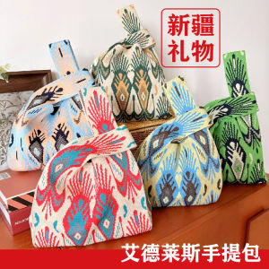 กระเป๋าสะพายไหล่ผ้าถักลายชาติพันธุ์สำหรับผู้หญิง กระเป๋าถือสไตล์ยูนนาน เวอร์ชั่นฤดูใบไม้ร่วงและฤดูหนาวปี 2014 วัสดุผ้าโพลีเอสเตอร์