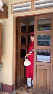 Áo dài cách tân nữ thích hợp đi chơi lễ tết kiểu truyền thống Kim Dung Miều Est.2013