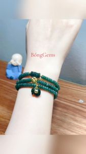 vòng tay nữ dáng chuỗi đá ngọc lam ngọc tự nhiên bánh xe mix đồng điếu lam ngọc charm cỏ 4 lá vàng tây và charm túi tiền lam ngọc bọc vàng tây vòng tay đá phong thủy trang sức