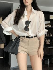 สูง เอว สีกากี เดนิม กางเกงขาสั้น ผู้หญิง พรางหุ่น ทรงเอ กางเกงฮอต ฤดูร้อน อินเทรนด์ การยาวขา กระโปรงสั้น กระเป๋าที่กระดุม