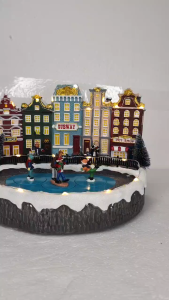 D&D Home l FC620 Amsterdam Village Christmas Decor with Icy Pond and Figurines Subway Storefront