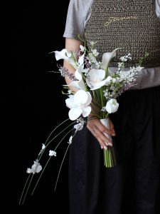 Bride Handheld Lilies of the Valley Silk Flowers Wedding Photography Studio Portrait Bridal Gown Travel Photography Celebration Bouquet