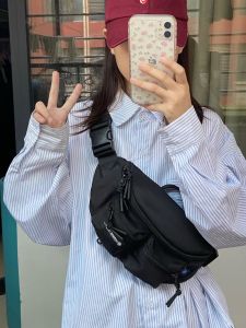 เสื้อเชิ้ตผู้หญิงทรงหลวมสีฟ้าลายทาง แจ็คเก็ตคาร์ดิแกนเปิดไหล่ ทรงหลวมสบายๆ สำหรับผู้หญิง ฤดูใบไม้ผลิและฤดูใบไม้ร่วง