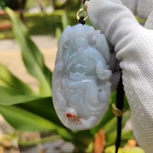 Rare 3 colors - crafted as Guan gong with lavender green and brownish red patches Natural Type A Jadeite Pendant with NGI Gemstone report weight 380.02 grams 72.30 * 41.08 * 15.00 mm Translucent Fine grain crystal aggregate (pendant115)