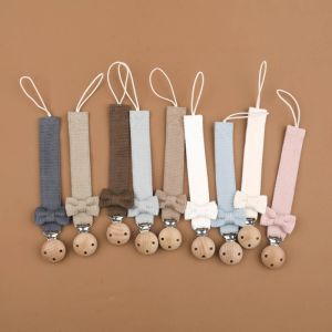 ห่วงโซ่ Pacifier พร้อมคลิปไม้และโบว์ Designs สีสัน & ความสนใจ Grabbing Pacifier คลิปการงอกของฟันผู้ถือของเล่น Essential