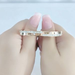SO SEOUL Valeria Roman Numeral Zig Zag Austrian Crystal Rose Gold Side Hinged Bangle