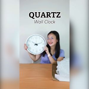 10 Inch Modern Quartz Wall Clock w/ Free Battery Included  Low Battery Consumption Durable & Quality Analog Clock for Living Rooms and Bedrooms