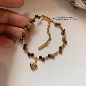 CAFFTI | Delicate Luxe Handwoven Tiger Eye Stone Heart Bracelet