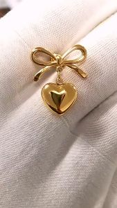 Hikaw 18k Saudi Gold Earrings: Pure Gold French Ribbon Knot & Heart-Shaped Bow