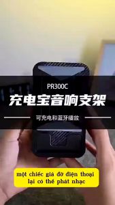 Loa Bluetooth Kèm Giá Đỡ Điện Thoại Kiêm Sạc Dự Phòng Siêu Hot .Tiện Dụng..