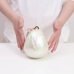 Túi Xách Cầm Tay Hình Trứng Bằng Acrylic Dành Cho Nữ Đính Hạt Ngọc Trai Sang Trọng Kiểu Dáng Thời Trang Thích Hợp Cho Đám Cưới Tiệc Tối