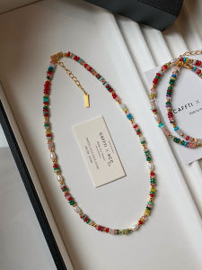 CAFFTI | Layerable Natural Pearl Beaded Rainbow Necklace
