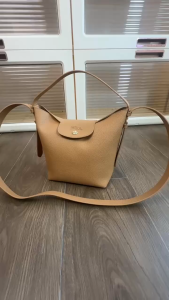 Womens bucket bag durable leather with magnetic snap closure adjustable shoulder strap hand-held crossbody bag large-capacity daily commuting multi-functional handbag