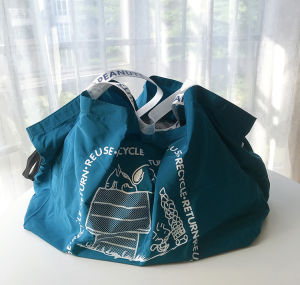 กระเป๋าเดินทางพับได้ขนาดใหญ่ที่ยืดหยุ่นได้หลากหลาย กระเป๋าช้อปปิ้งผ้าไนลอนที่เป็นมิตรต่อสิ่งแวดล้อม กระเป๋าช้อปปิ้งลาย Snoopy ของ ORANTRIP